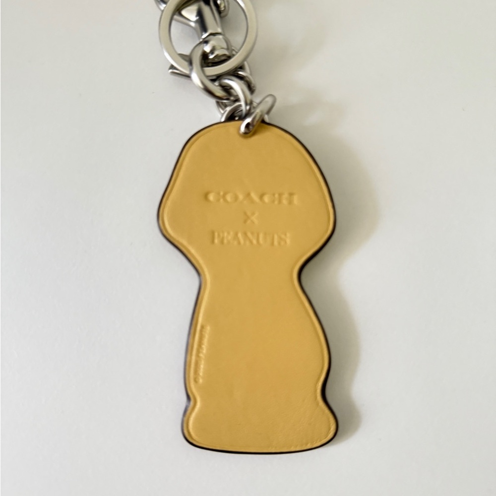 Coach X Peanuts Charlie Brown Bag Charm CBG59 NWT - Picture 3 of 4